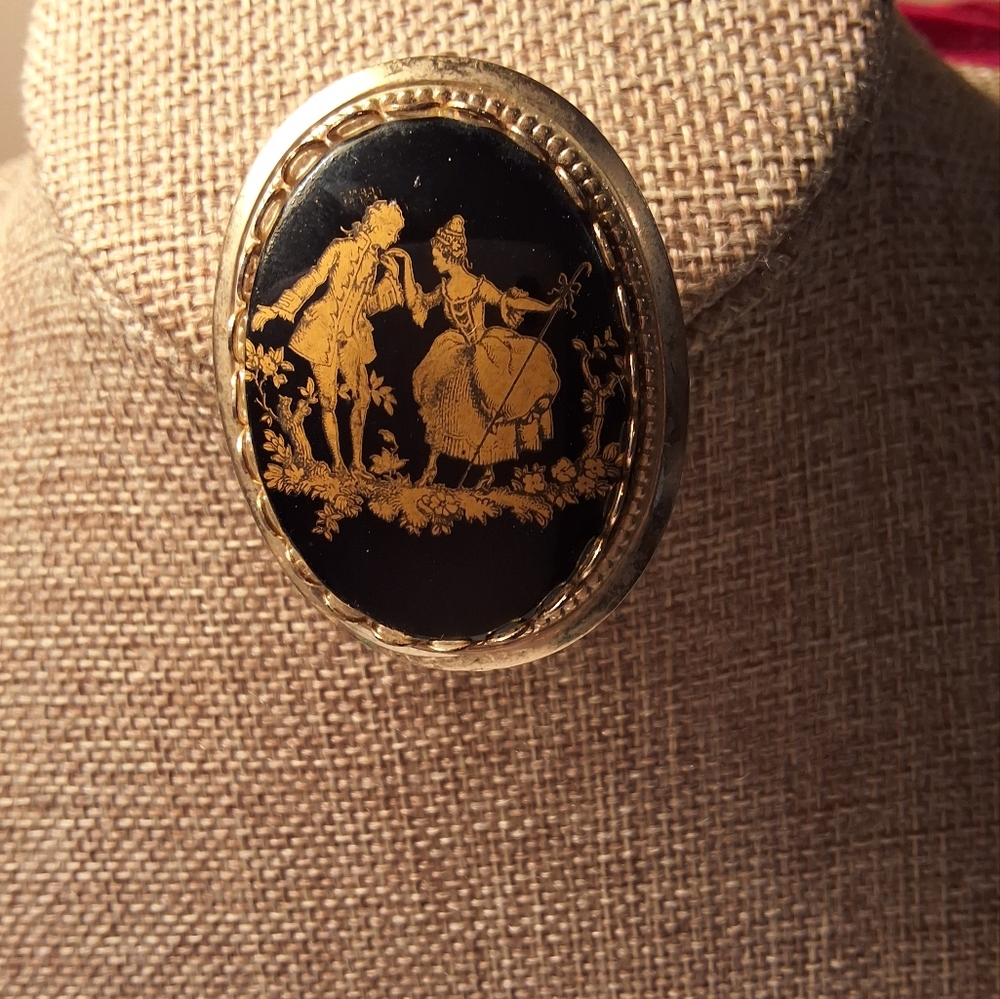 Elegant Black and Gold Brooch